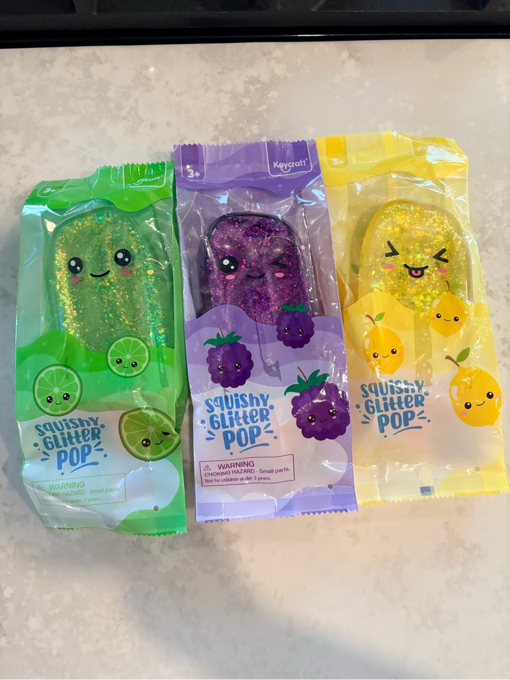 Keycraft from CVS Squishy Glitter Pop – Green, Purple & Yellow Glitter popsicles